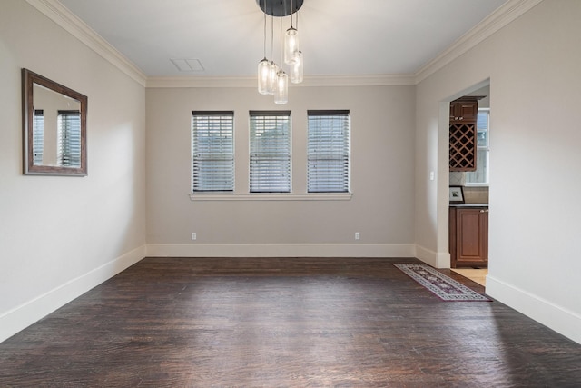 unfurnished dining area with a chandelier, dark wood-type flooring, and ornamental molding