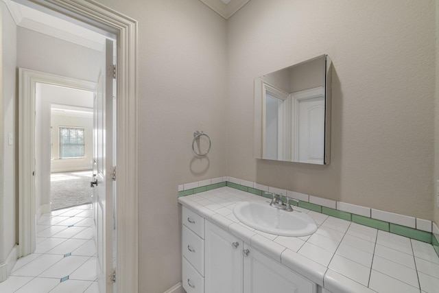 bathroom featuring tile patterned floors and vanity