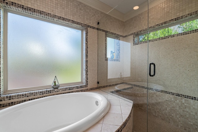 bathroom with shower with separate bathtub