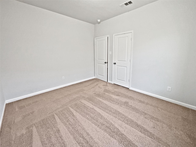 empty room with carpet floors