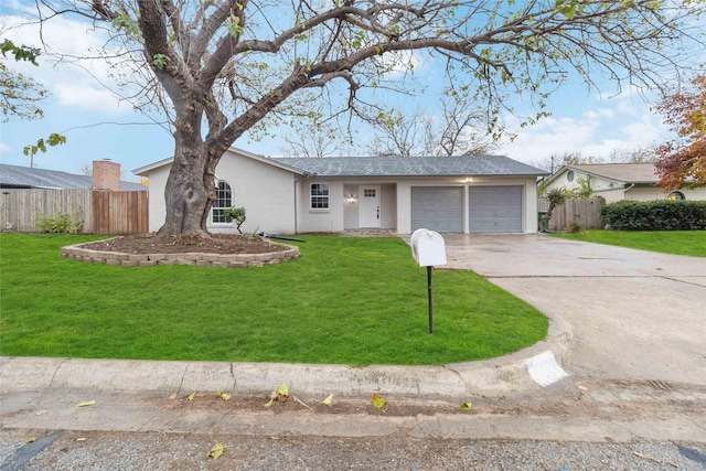 single story home featuring a front lawn and a garage