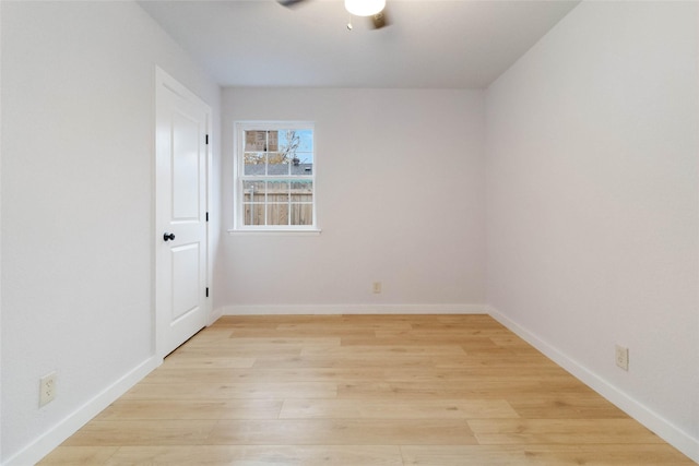 spare room with light hardwood / wood-style flooring