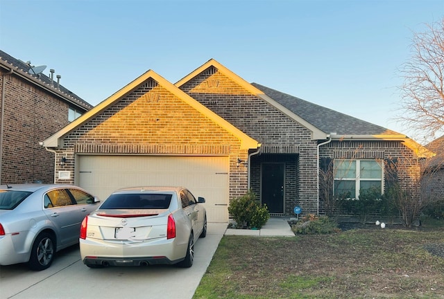 view of front of home featuring a garage