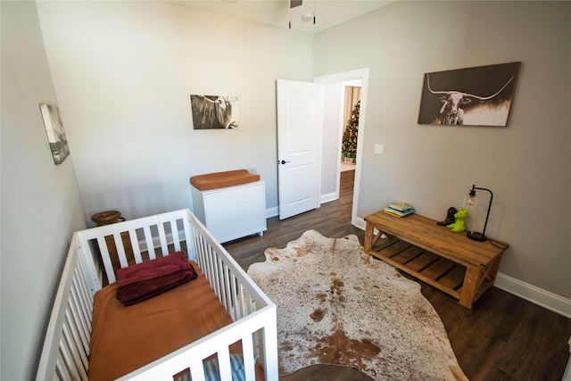 bedroom featuring dark hardwood / wood-style flooring