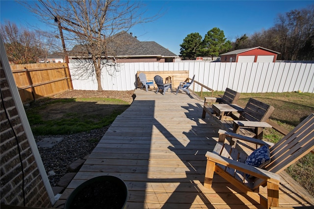 wooden deck with a yard