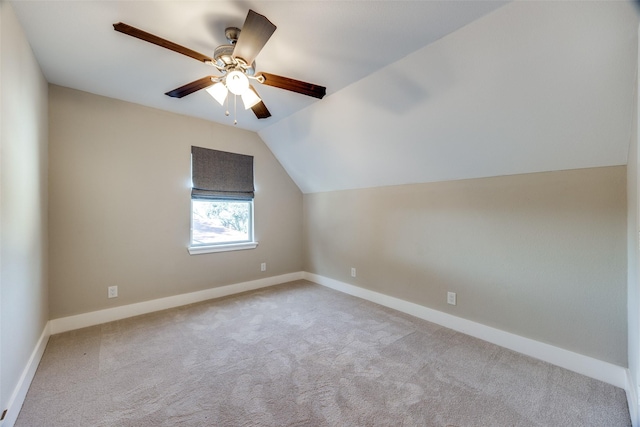 bonus room with ceiling fan, light colored carpet, and lofted ceiling