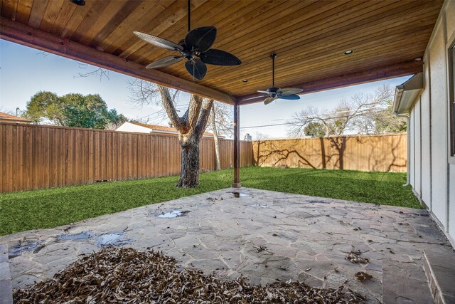 view of patio featuring ceiling fan