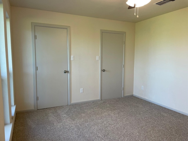 unfurnished bedroom with carpet