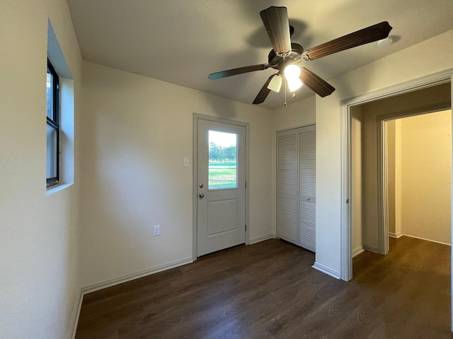 interior space with dark wood-type flooring