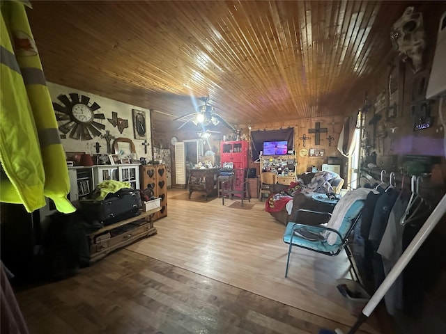 interior space with hardwood / wood-style flooring, ceiling fan, and wood ceiling