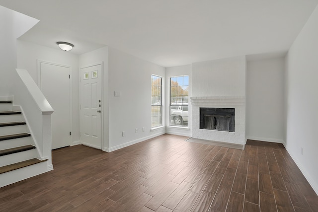 unfurnished living room featuring a fireplace