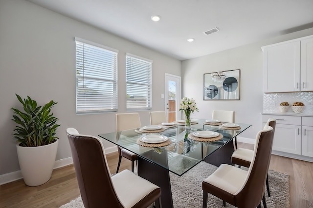 dining space featuring light hardwood / wood-style floors