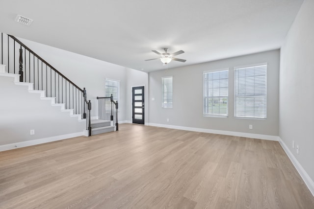 interior space featuring ceiling fan and light wood-type flooring