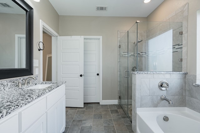 bathroom with vanity and plus walk in shower