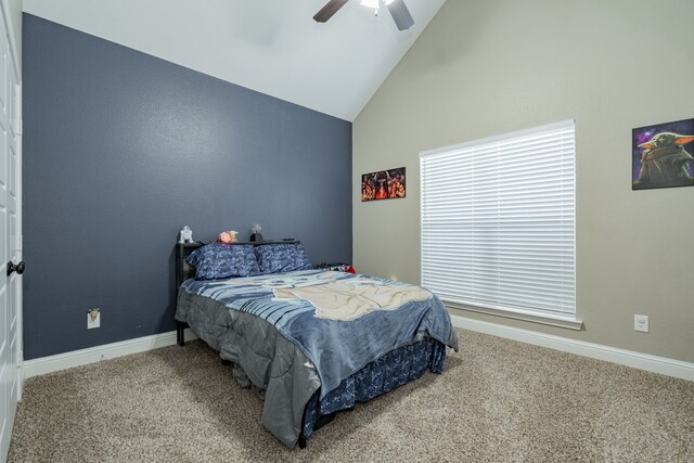 bedroom featuring carpet floors, high vaulted ceiling, and ceiling fan