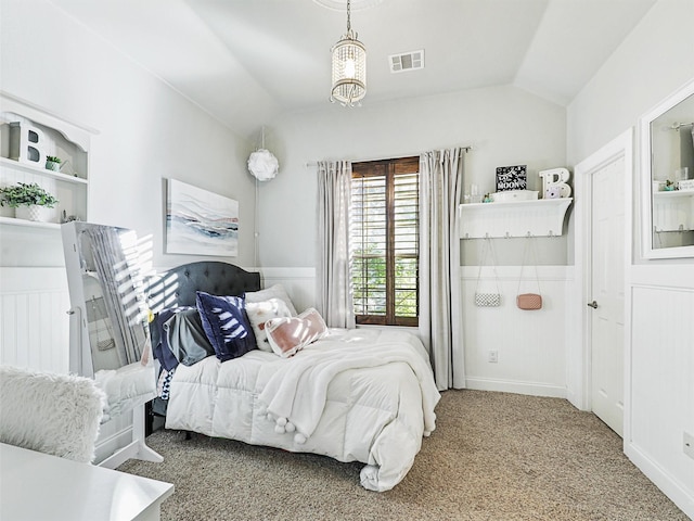 bedroom featuring carpet floors and lofted ceiling