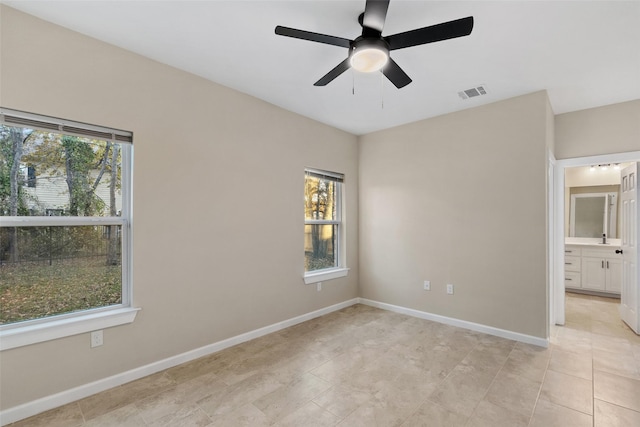 spare room featuring ceiling fan