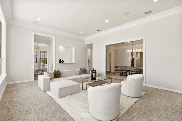 living room featuring light carpet, ornamental molding, visible vents, and recessed lighting