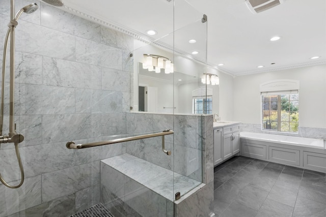 bathroom featuring tile patterned flooring, shower with separate bathtub, vanity, and ornamental molding