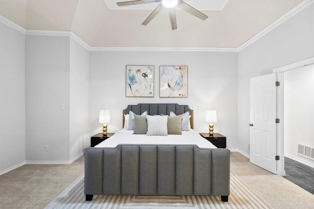 bedroom with light colored carpet, vaulted ceiling, visible vents, and baseboards