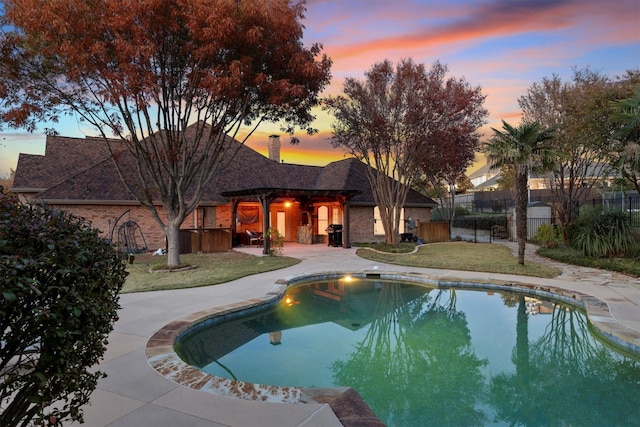 view of pool featuring a patio area