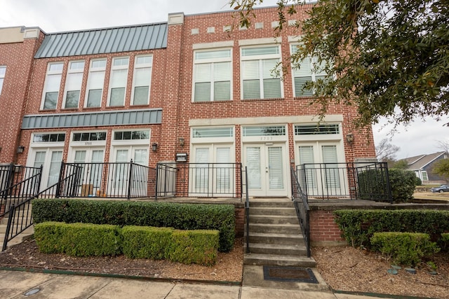 view of property with french doors