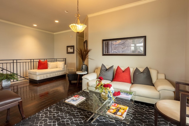 living room featuring hardwood / wood-style floors and ornamental molding