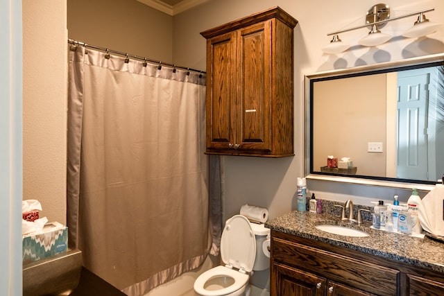 bathroom with a shower with curtain, vanity, toilet, and crown molding