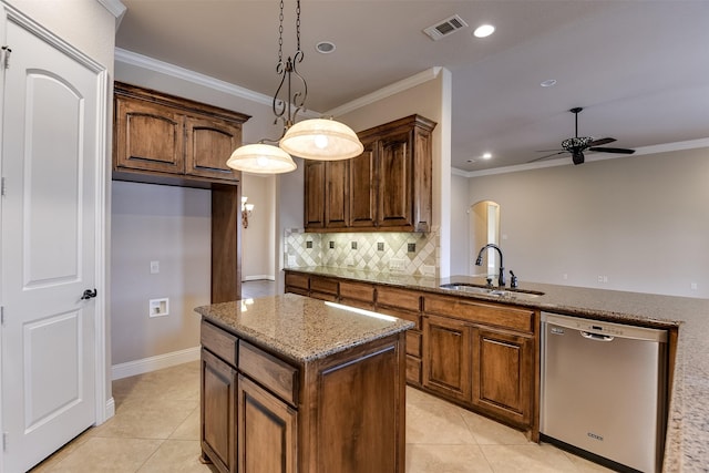 kitchen with light stone counters, stainless steel dishwasher, ceiling fan, sink, and light tile patterned floors