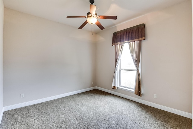 empty room featuring carpet flooring and ceiling fan