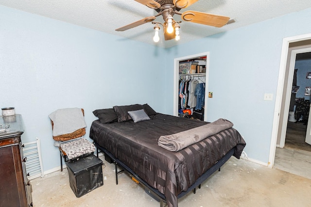 bedroom featuring a textured ceiling, a closet, and ceiling fan