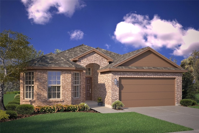 view of front facade with a yard and a garage