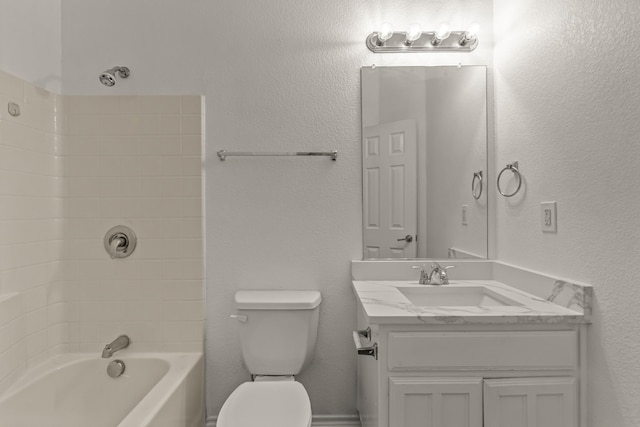 full bathroom featuring shower / bathing tub combination, vanity, and toilet