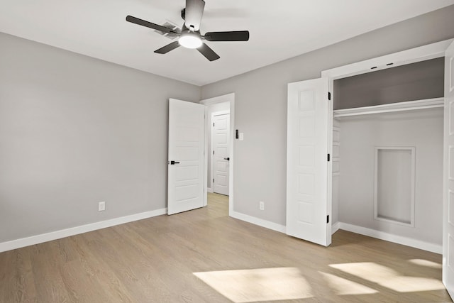 unfurnished bedroom with ceiling fan, a closet, and light hardwood / wood-style flooring