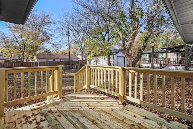 wooden terrace with an outdoor structure