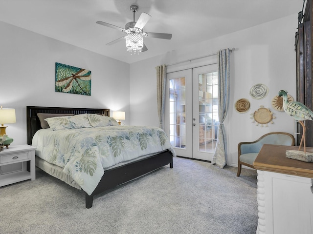 carpeted bedroom featuring ceiling fan, access to exterior, and french doors