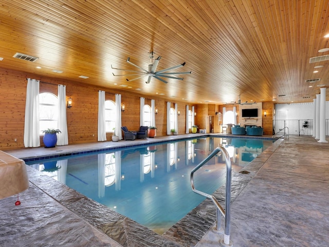 view of pool featuring ceiling fan