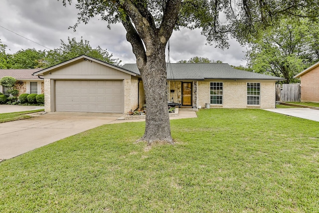 single story home with a garage and a front lawn