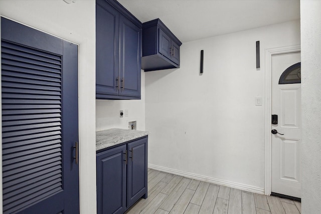 kitchen with blue cabinetry