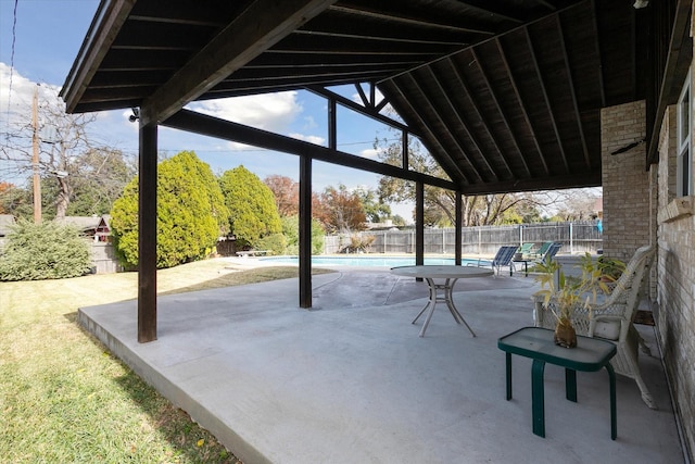 view of patio featuring a fenced in pool