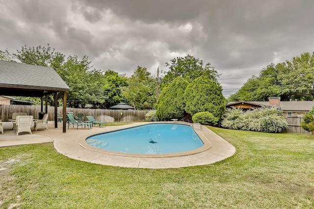 view of pool with a yard, a patio area, and a gazebo