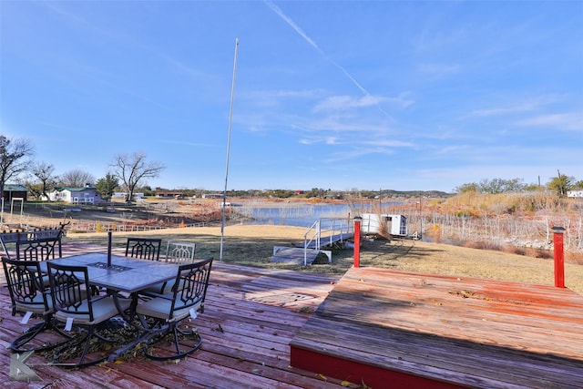 deck featuring a water view