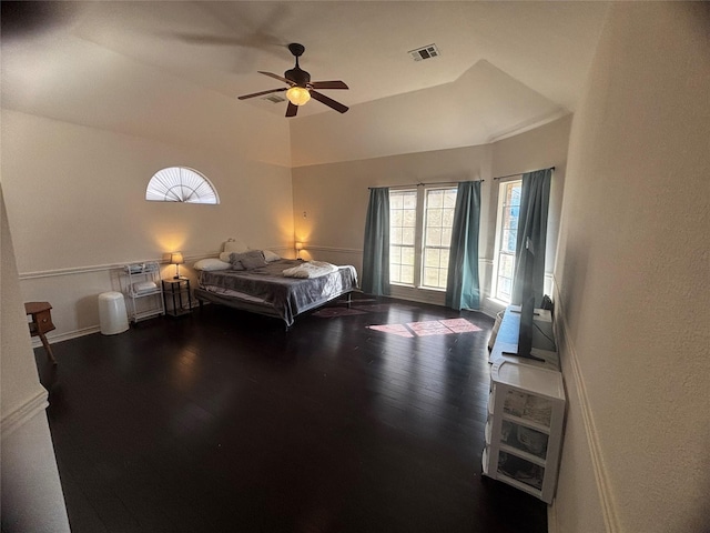 unfurnished bedroom featuring dark hardwood / wood-style floors and ceiling fan