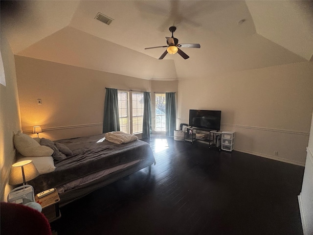 unfurnished bedroom featuring vaulted ceiling, ceiling fan, and dark hardwood / wood-style flooring