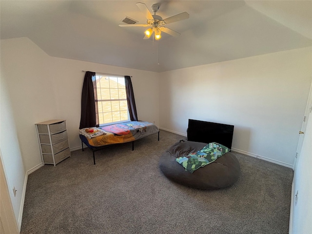 carpeted bedroom with vaulted ceiling and ceiling fan