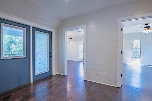 entryway featuring dark hardwood / wood-style floors, ceiling fan, and lofted ceiling