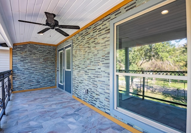 view of patio / terrace featuring ceiling fan