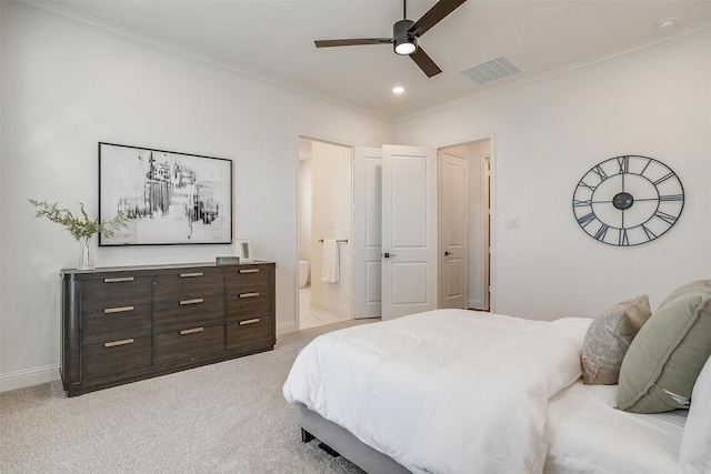 bedroom with ceiling fan, ensuite bathroom, ornamental molding, and light carpet