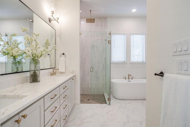 bathroom featuring plus walk in shower and vanity