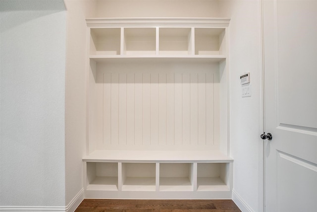 mudroom with dark hardwood / wood-style flooring